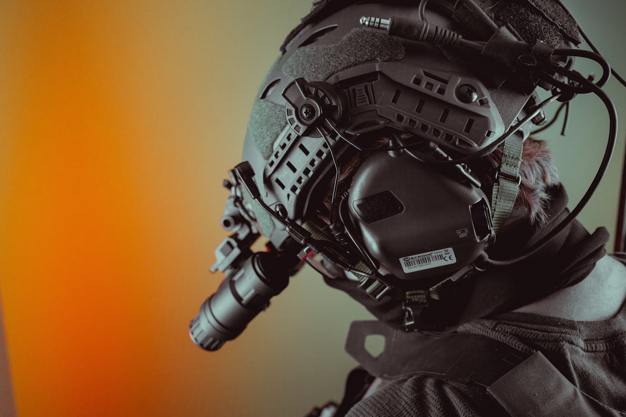 Close-up of a tactical helmet equipped with night vision gear, emphasizing technology.